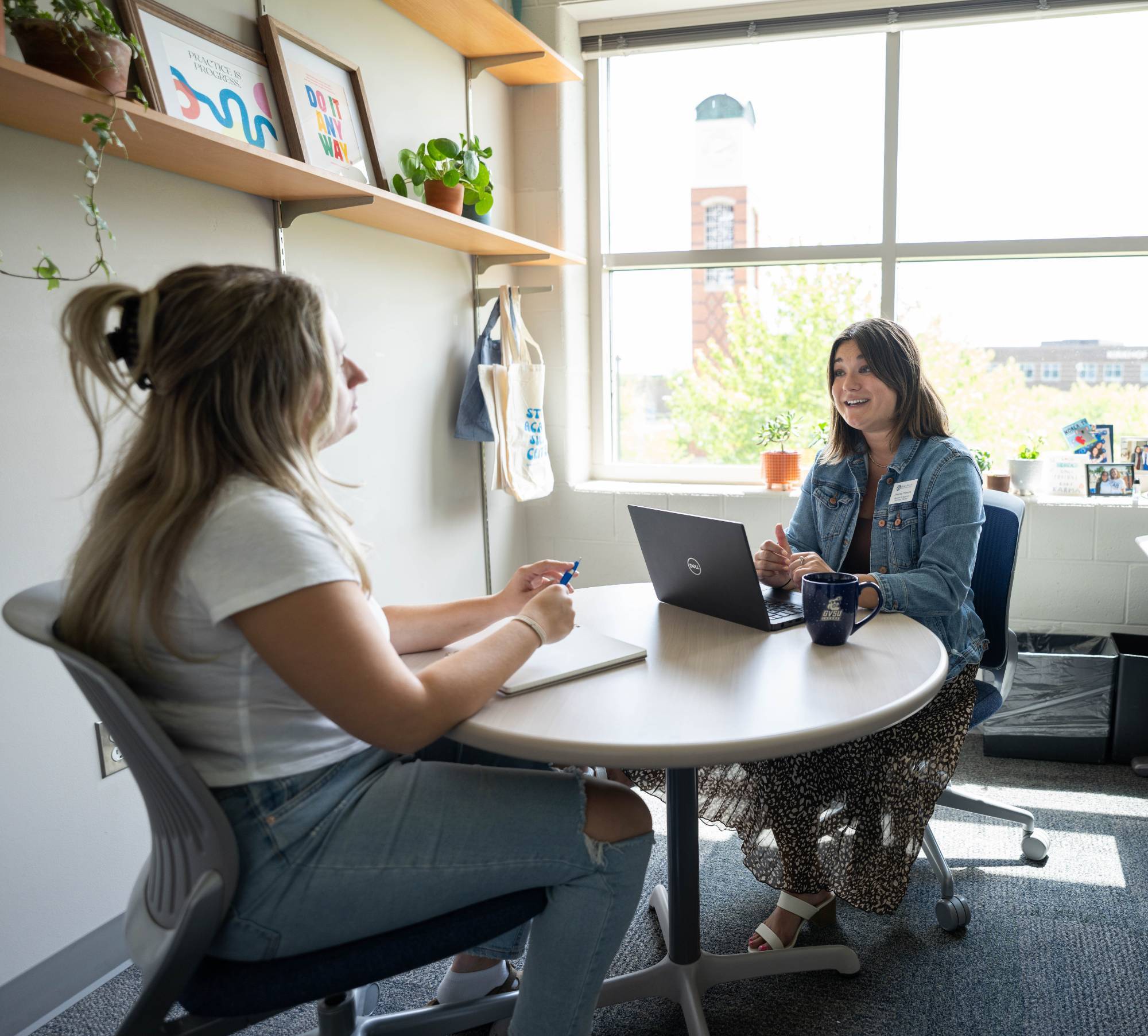 A student meeting with a success coach